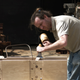 Image for article titled Casting Molten Metal On Wood With a Hungarian Design Master